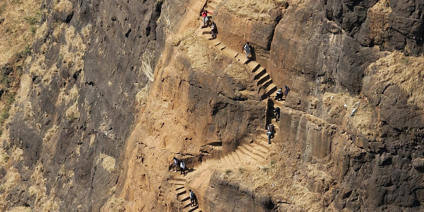 An image showing a scenic trail leading to Kalavantin Durg, a popular spot near Prabalgad Fort.