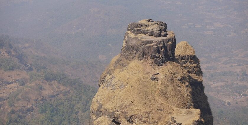 Kalavantin's Mahal, a historic tourist attraction near Maharashtra, has stone arches.