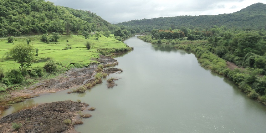 Kali River offering a serene landscape for rafting, relaxation, and family picnics.