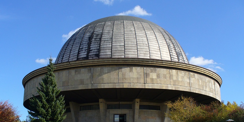 A front view of the Kalpana Chawla Planetarium, a famous tourist attraction in Haryana.