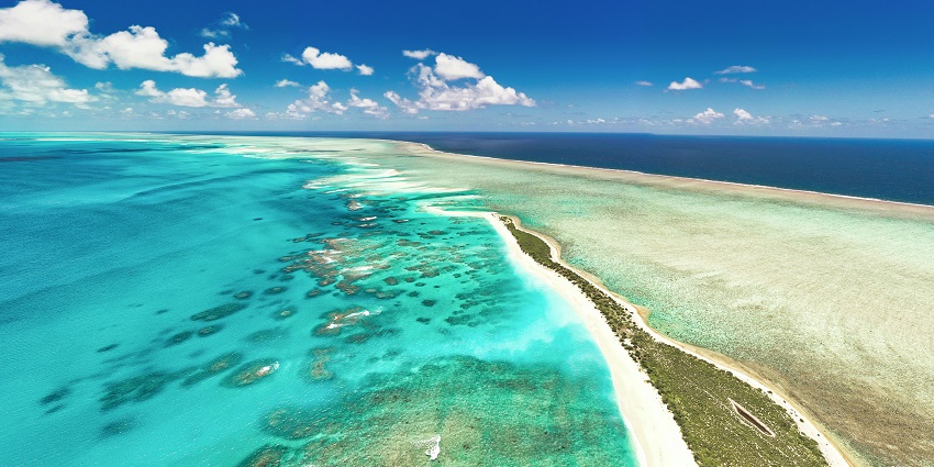 A mesmerising view of Kalpeni Island featuring pristine golden sands and azure waters.