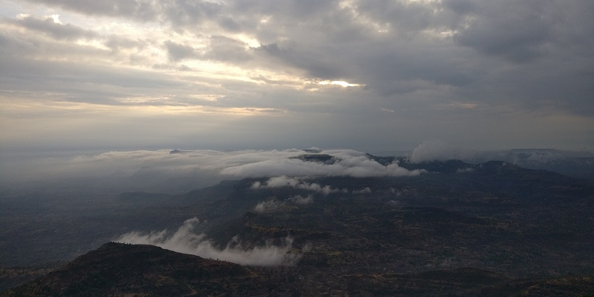A beautiful sunrise view from Kalsubai Peak, a famous place near Dhodap Fort