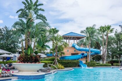 A vibrant view of Kalyan Water Park with slides, pools, and families enjoying the water attractions.