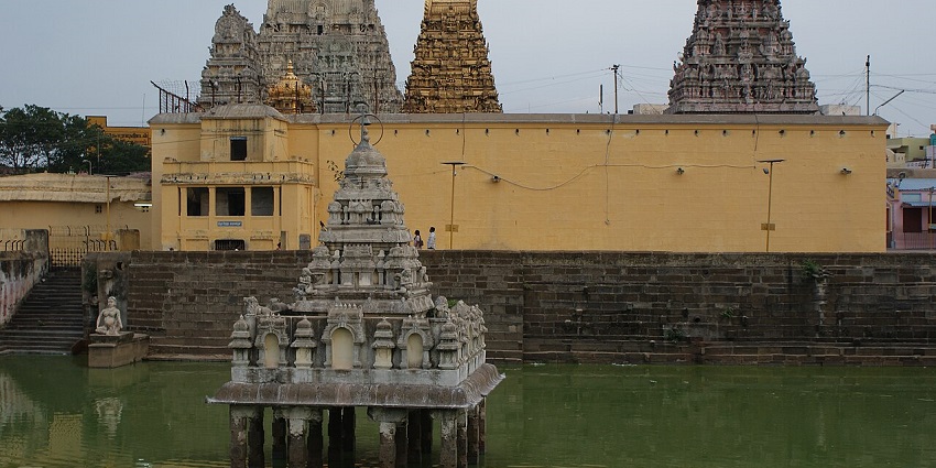 A view of Kanchipuram Kamakshi Amman Temple in Tamil Nadu features intricate architecture