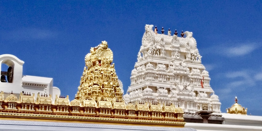 The complex of Kamakshi Amman Temple in Kanchipuram surrounded by white pillars