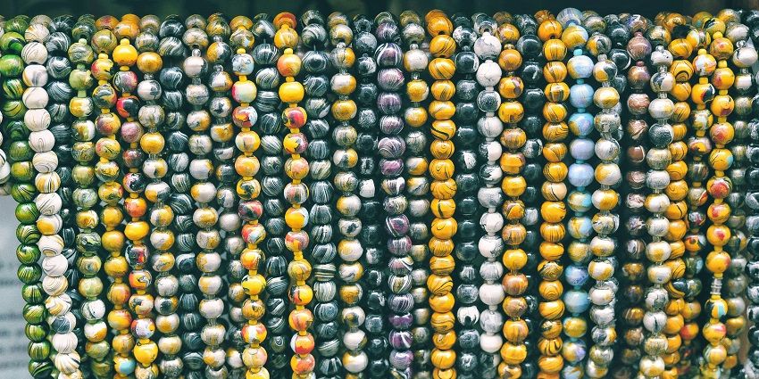 Shoppers come across colourful beads in jewellery stalls.