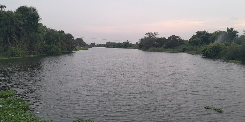 River flowing between the hills and valleys at Mauli Nager Reserve Wall in Kamshet, one of the places for paragliding near Pune.