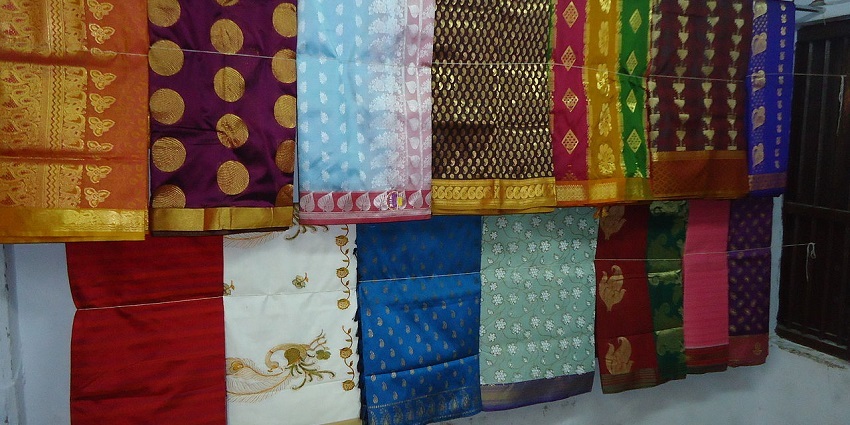 An image showing Kanchipuram sarees, known for their rich colour and design.