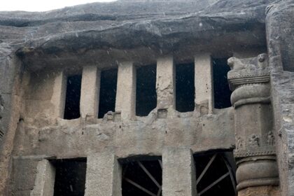 Scenic view of Kanheri Caves showcasing ancient rock-cut architecture.