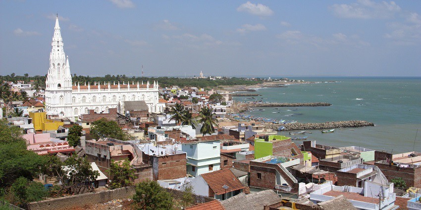 Picture of Kanyakumari, showcasing the beautiful church and the houses around it.