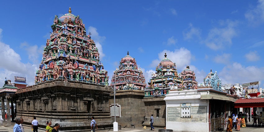 Interior view of Arulmigu Kapaleeswarar Temple in Chennai, showcasing ornate sculptures.