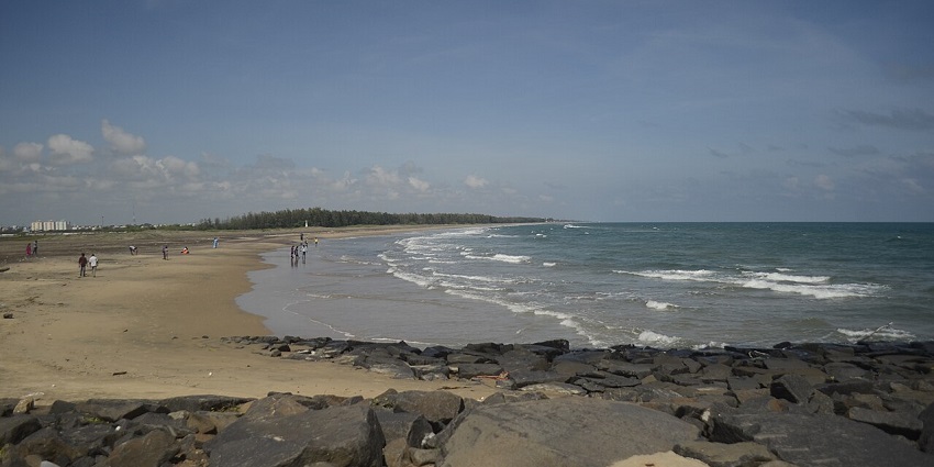 Tranquil beach near Nagapattinam Buddhist Monastery offering relaxing atmosphere.