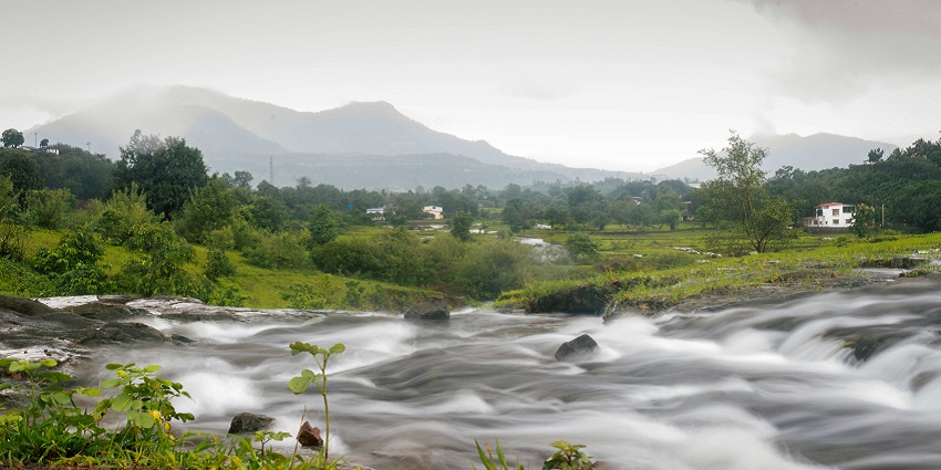 An image of a lake on Pali Bhutivali Reservoir near Karjat, Maharashtra, India.