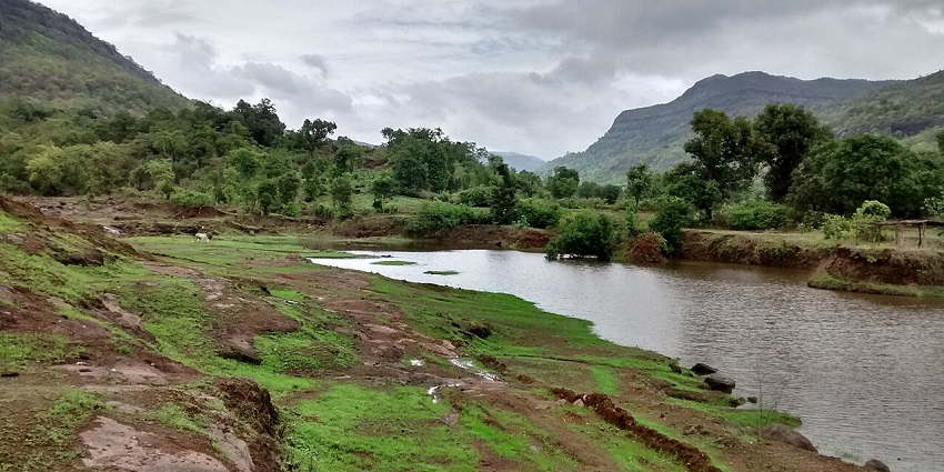 Panoramic view of Karjat, a popular destination near Songiri Fort, featuring lush green hills