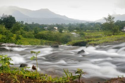 A scenic view of Karjat’s trails, showcasing lush landscapes and greenery all around.