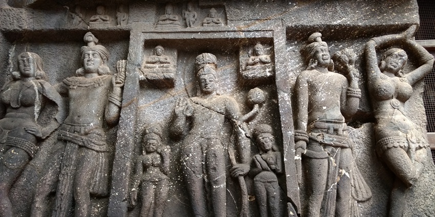 Image of sculptures engraved on the walls of Karla Caves, a popular cave in Maharashtra.