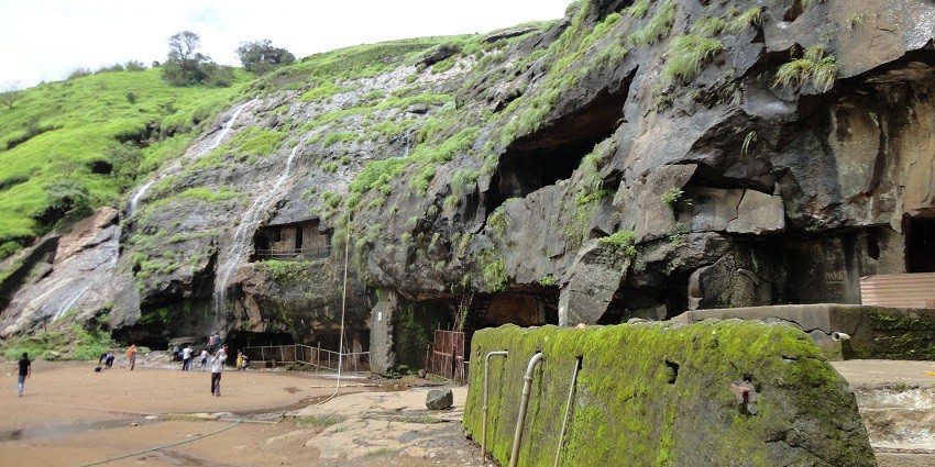 An image of the ancient rock-cut Karla Caves showcasing historical architecture.