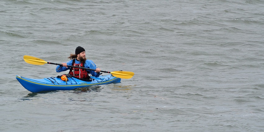 Paddle through serene waters, enjoying nature and tranquility on the kayak.