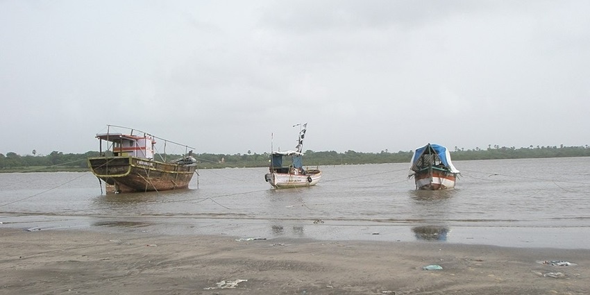 View of fishing beats on the sandy shores of Kelve beach