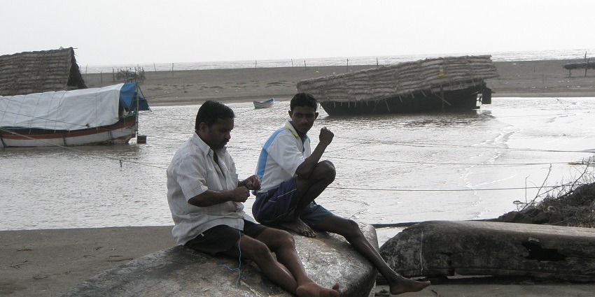 Fisherman at Kelva Beach, capturing the charm of beautiful beaches in Nashik.