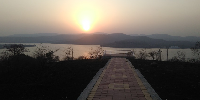 A restfulness view of Khadakwasla lake with a sunset vision near Krushnai water Park