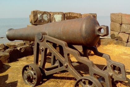 British cannon positioned at Khanderi Fort, showcasing historical military heritage.