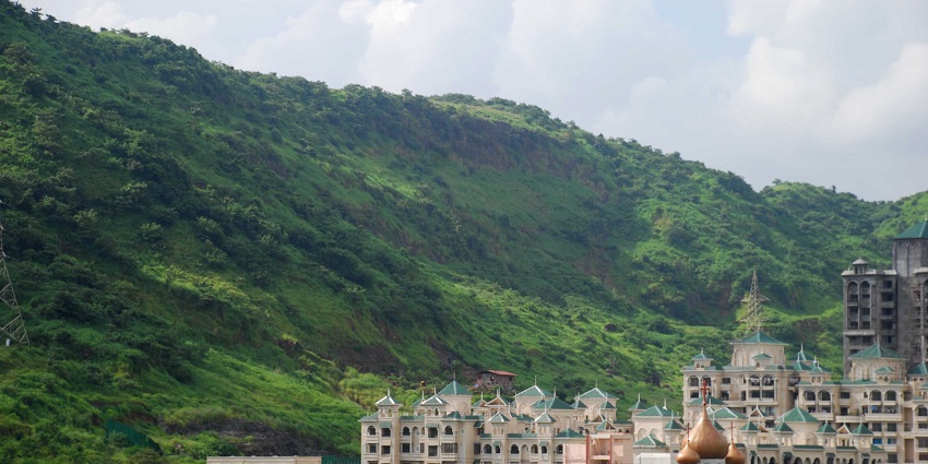 One of the places to visit in Navi Mumbai with friends is Kharghar Hills offering serenity.