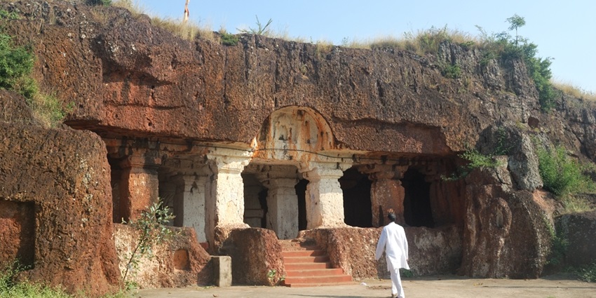 A view of Kharosa Leni caves, a tourist attraction near Ausa Fort, featuring intricate carvings.