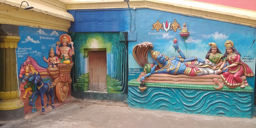 An image of the Maha Vishnu statues at the temple showcasing detailed stone carvings.