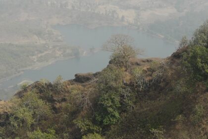 Panoramic landscape seen from Kohoj Fort, showcasing a scenic view of lakes and hills.