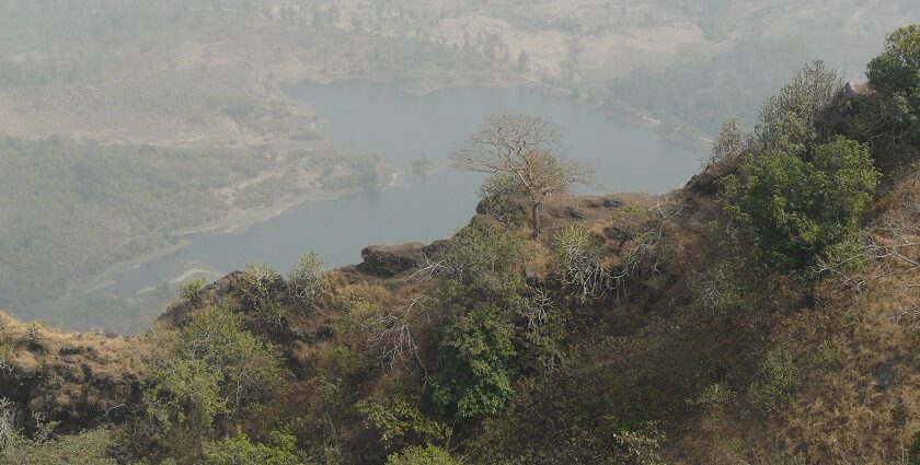 Panoramic landscape seen from Kohoj Fort, showcasing a scenic view of lakes and hills.