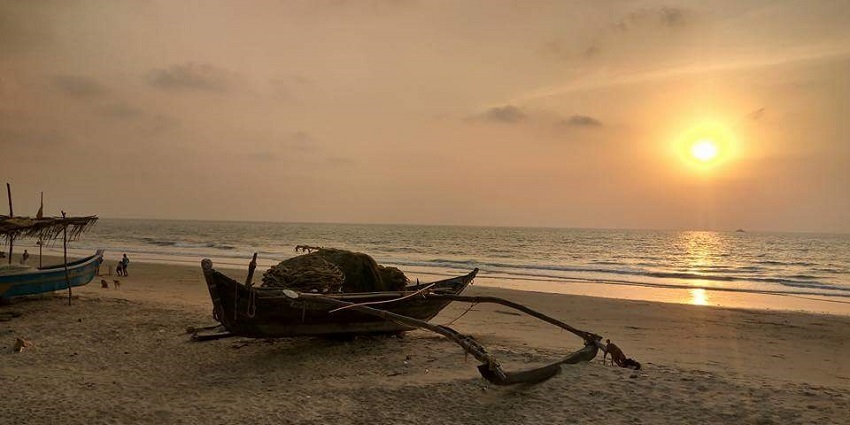 Kolamb Beach, a tranquil coastal escape with soft sand and gentle waves.