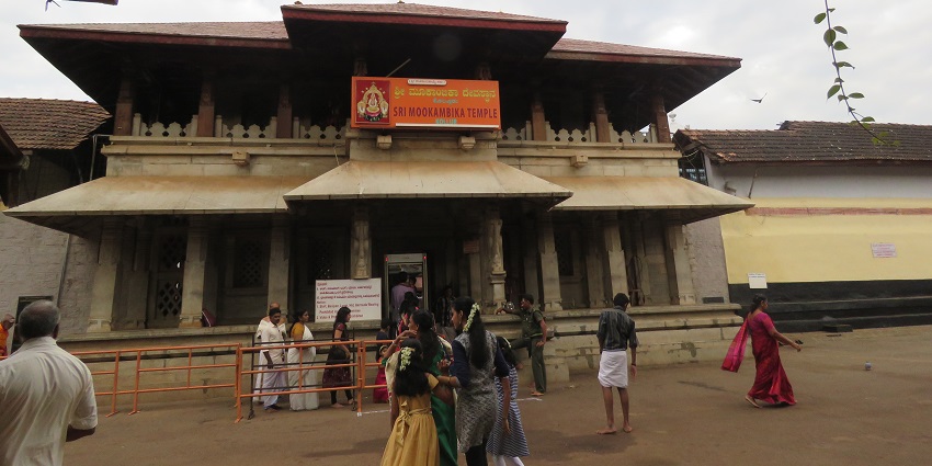 A view of Kollur Mookambika Temple's intricate architecture and serene surroundings.