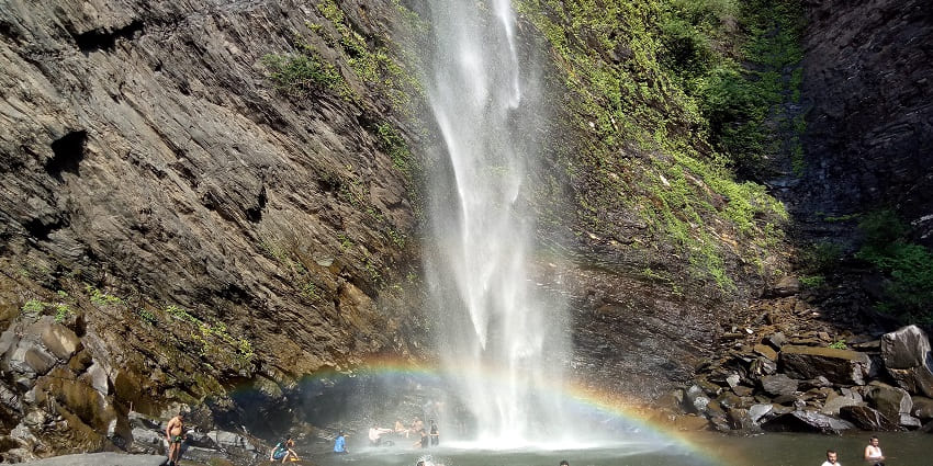Koodlu Theertha Falls, a magnificent waterfall cascading through lush greenery