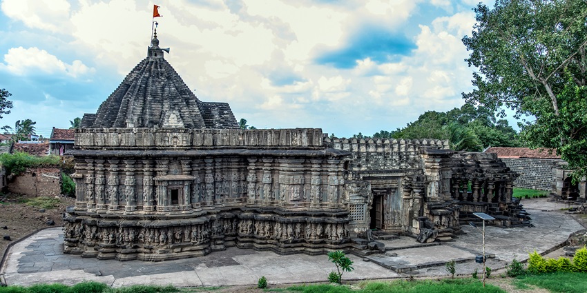 Explore the stunning side view of Kopeshwar Temple, showcasing intricate architecture.