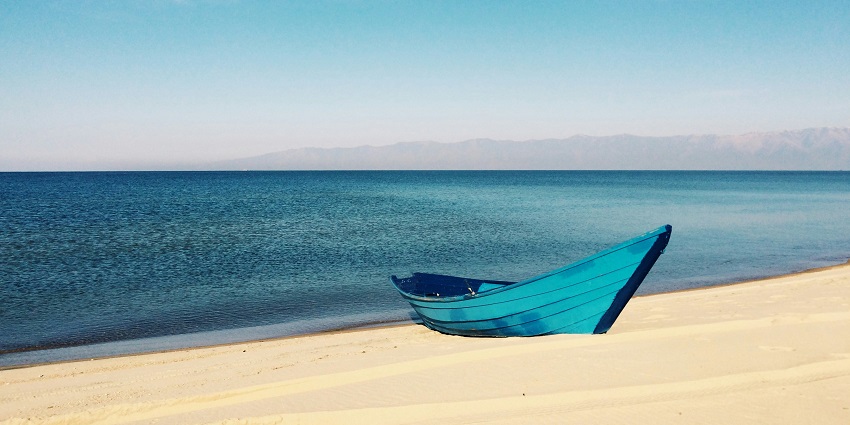 A serene view of the shimmering blue waters of Korlai Beach, a hotspot in Maharashtra.