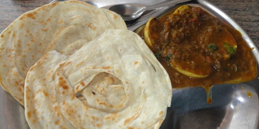 Flavorful kothu parotta available late-night for satisfying hunger cravings