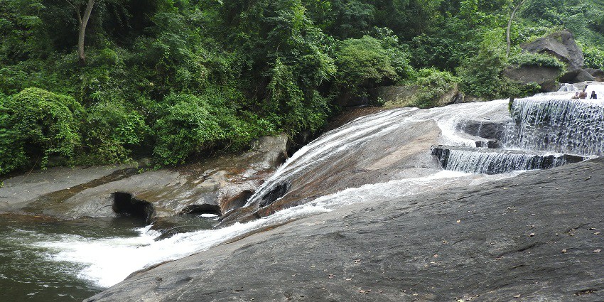 Cascading Kovai Kutralam Waterfalls, one of the top attraction near Velliangiri Temple.