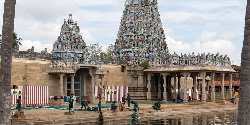 Traditional South Indian temple with ornate pillars, serene ambiance, and heritage architecture nestled in rural Tamil Nadu.