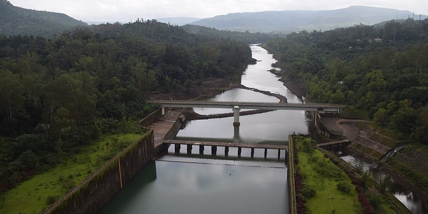 Koyna Dam spillway and canal view near Vasota Fort in Maharashtra, showcasing nature.