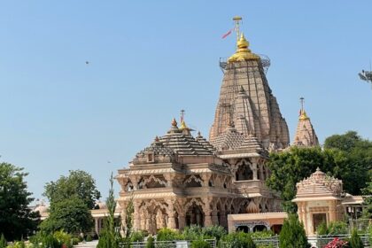 A glimpse of a famous spiritual attraction in Maharashtra surrounded by lush greenery.