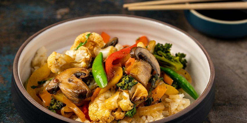 Image of Rice Bowl with Mixed Vegetable Toppings in a restaurant - Krushnakala Pure Veg Family Restaurant