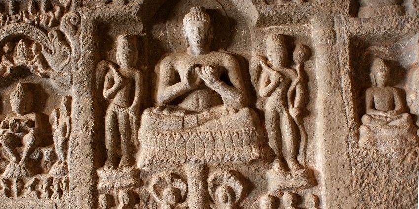 Kuda Caves, the ancient Buddhist rock-cut caves with intricate carvings.