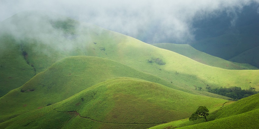 Places to visit in Karnataka in September is Kudremukh, the stunning mountain range.