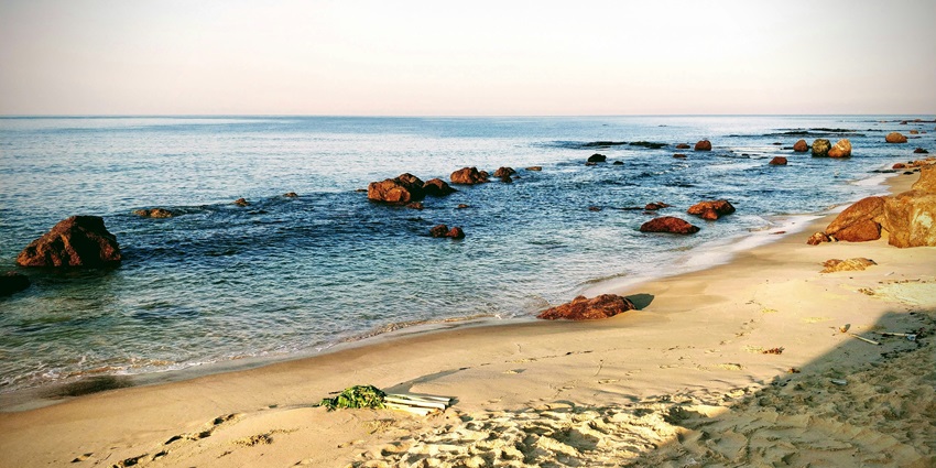 Picture of Kunkeshwar beach, glistening golden sand like diamonds in this quiet ambience.