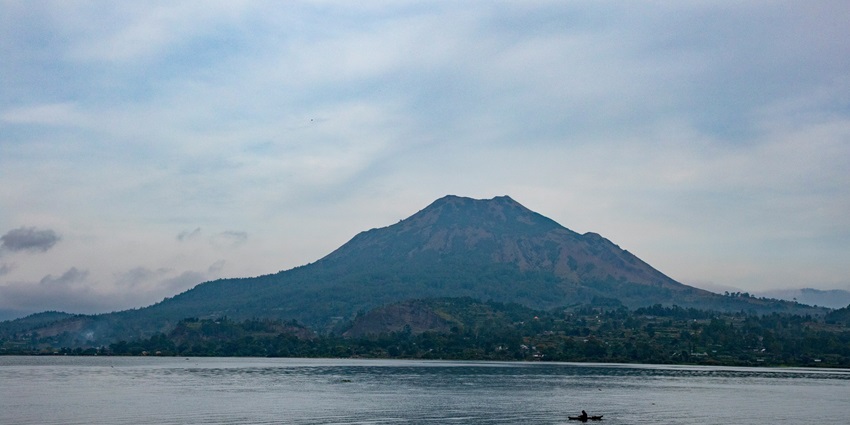 The tranquil Lake Batur with its serene waters reflecting the surrounding mountains.
