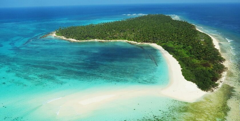 Picturesque view of Lakshadweep Islands with aerial view of turquoise colour water and greenery island