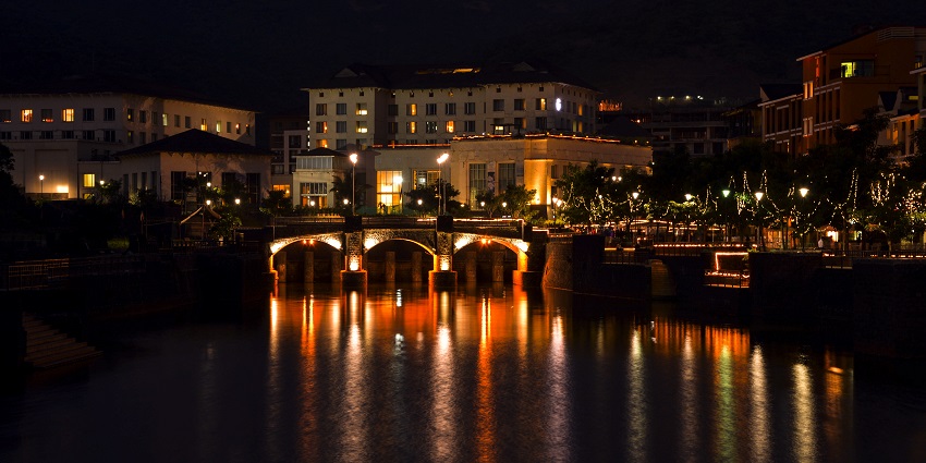 View of Lavasa city with illuminated buildings, a famous tourist attraction in Mulshi