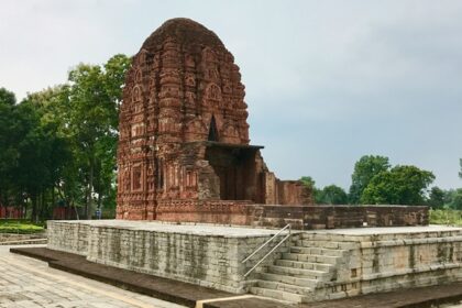 An image of the Laxman Temple, showcasing its ancient brick architecture during the day.