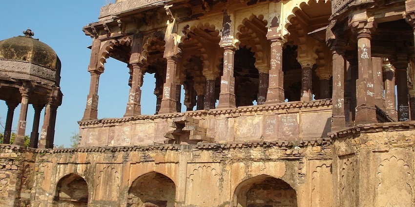 Stunning architecture of a palace inside Khandar fort which has stone-carved pillars.